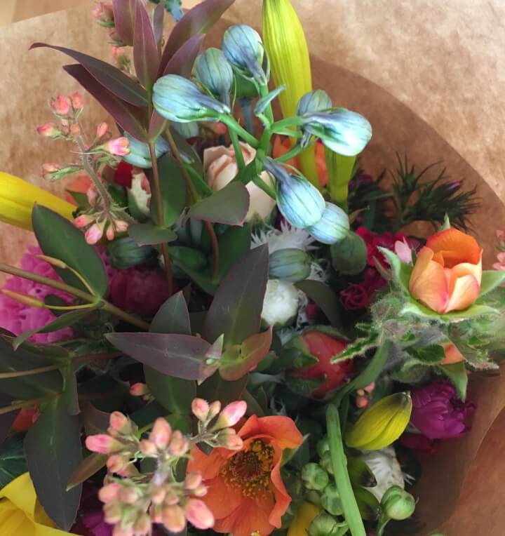 Posy flowers in a jam jar image